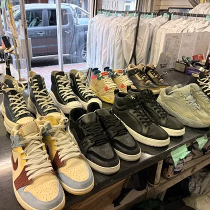 Cleaned trainers on the rack at Purley Dry Cleaners
